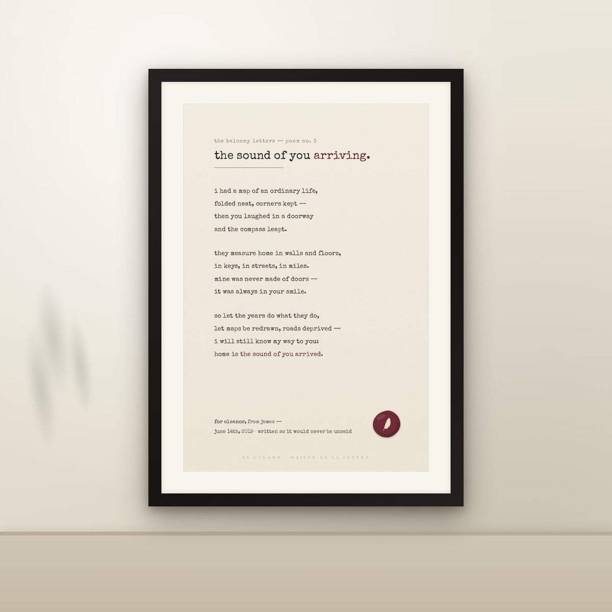 Le Poème Typewriter edition framed on a wall
