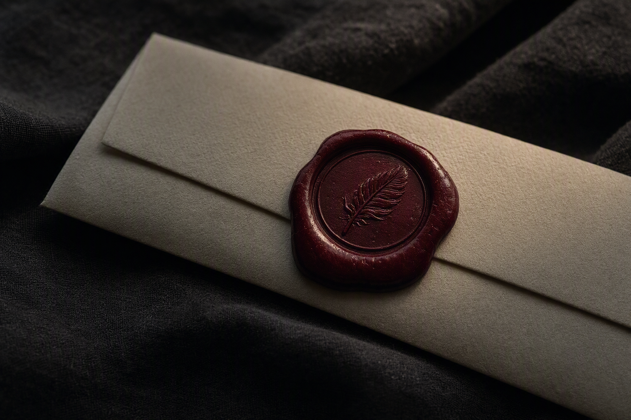 The burgundy plume wax seal of the house
