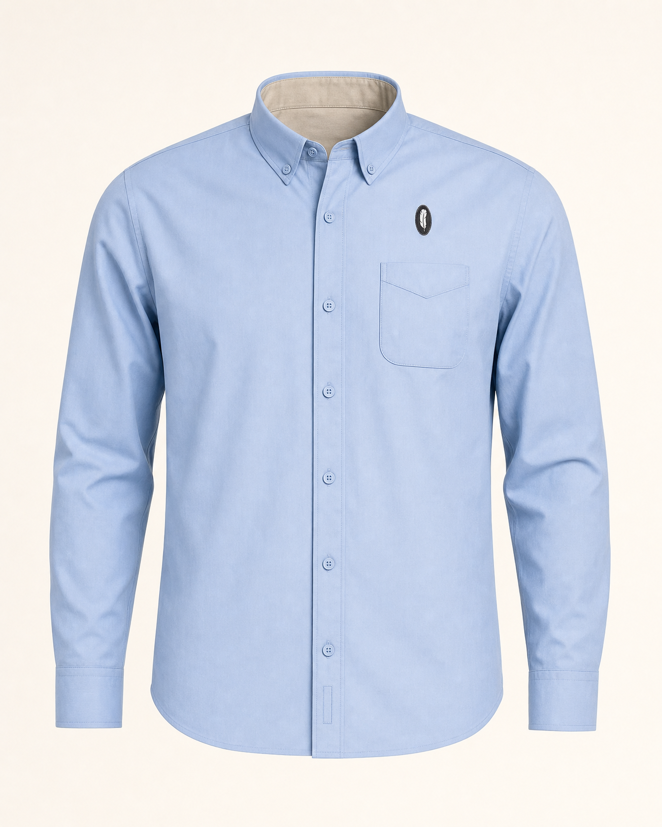 The Halcyon — light blue embroidered long sleeve shirt with feather crest