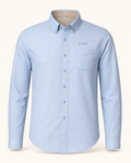 The Cove — light blue embroidered long sleeve shirt with de CYRANO wordmark