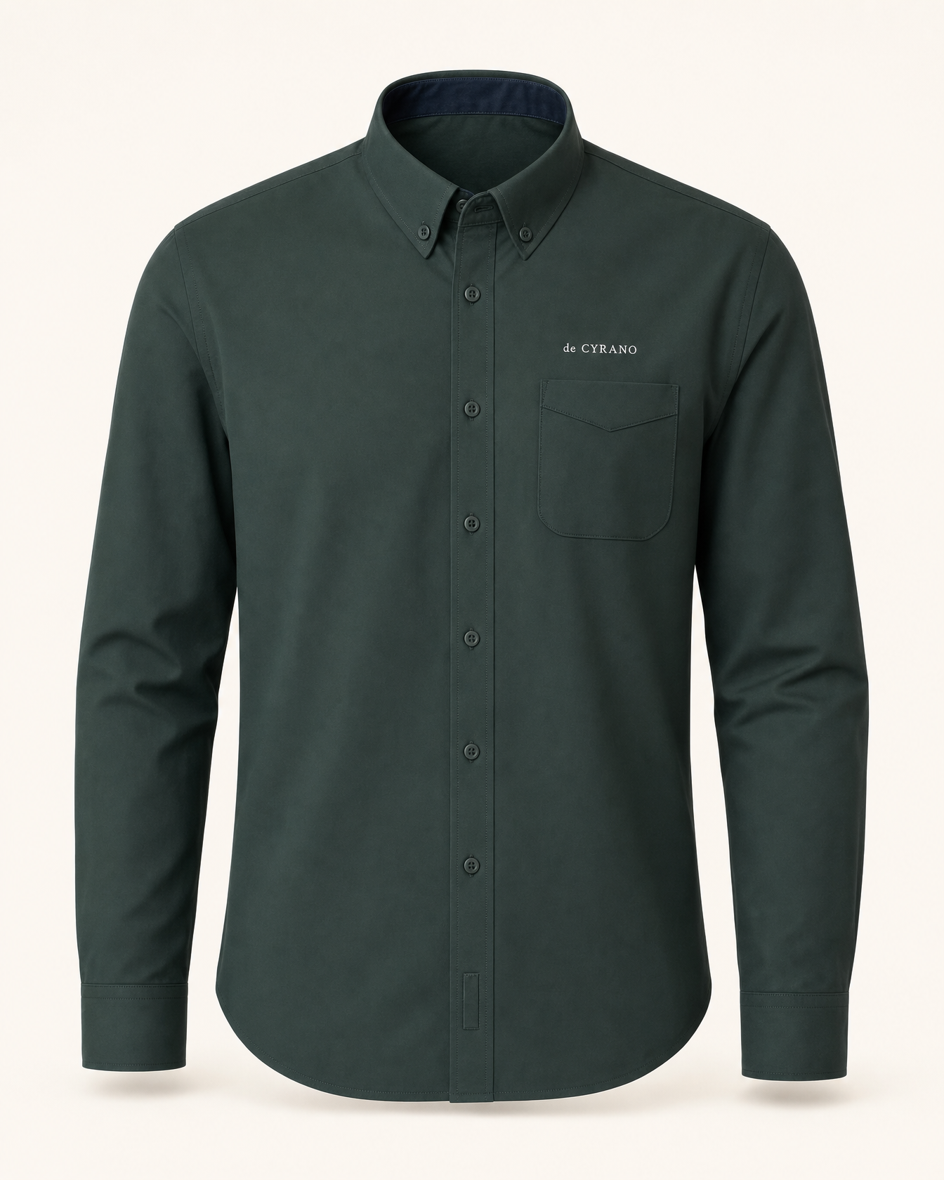 The Thicket — dark green embroidered long-sleeve shirt with de Cyrano wordmark