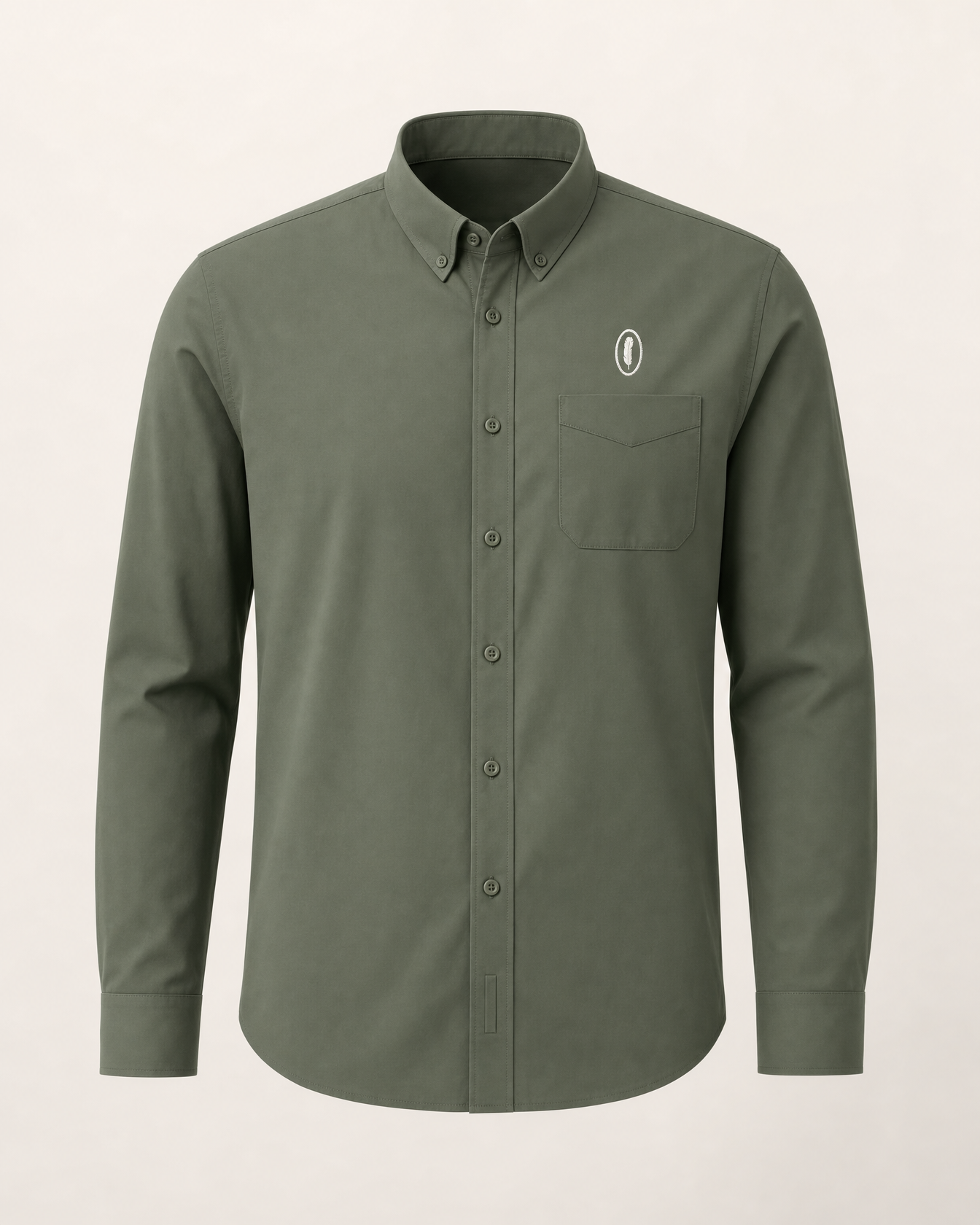 The Shamrock — clover green embroidered long-sleeve shirt with feather crest