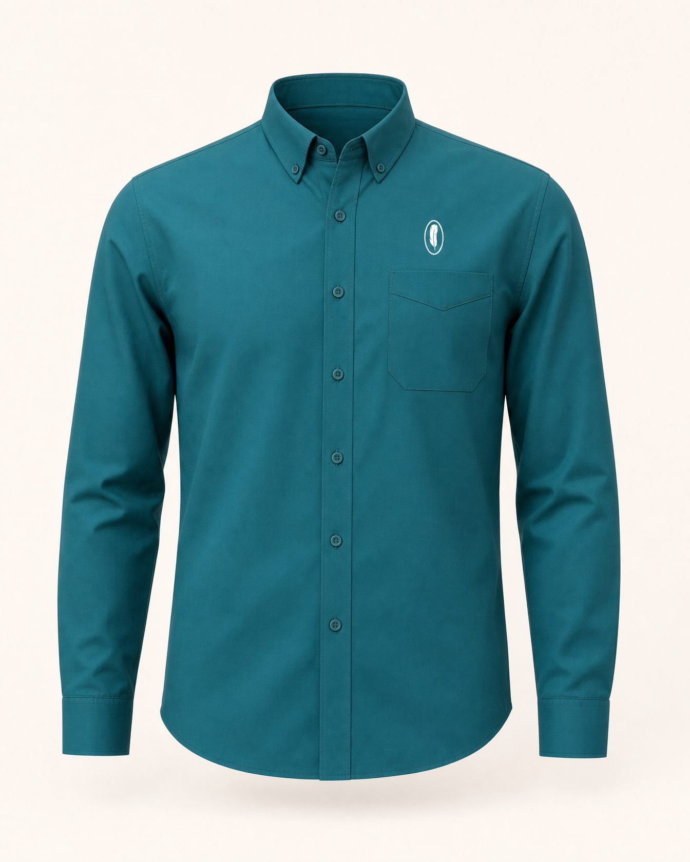 The Lagoon — teal green embroidered long-sleeve shirt with feather crest