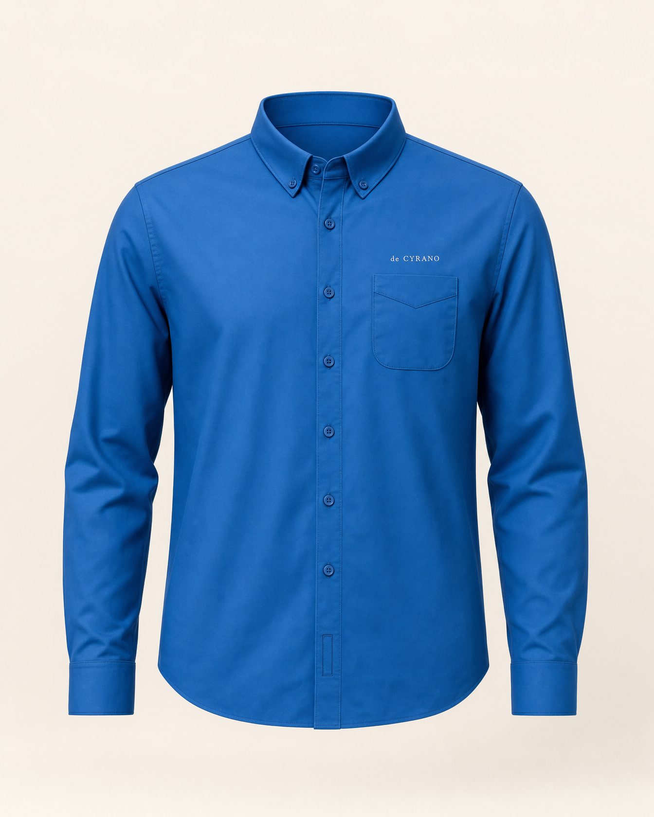 The Tide — strong blue embroidered long-sleeve shirt with de Cyrano wordmark